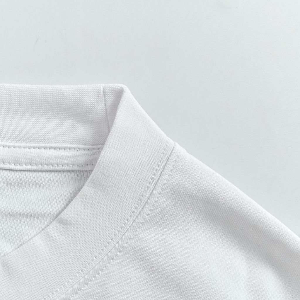 Louis Vuitton Embossed Logo Long Sleeve T-Shirt - White