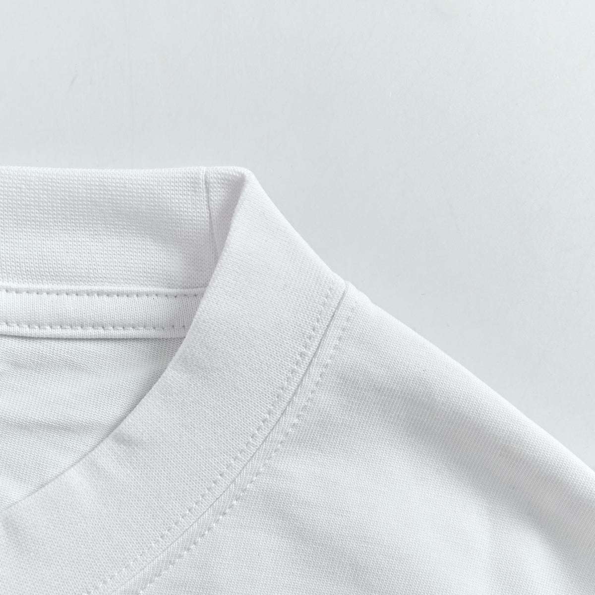 Louis Vuitton Embossed Logo Long Sleeve T-Shirt - White