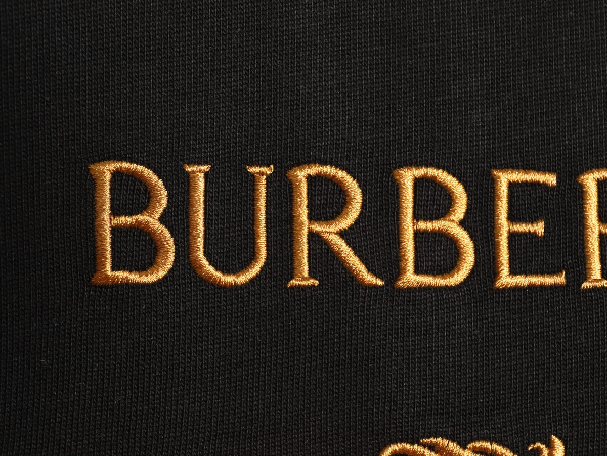 Burberry 26SS Gold Equestrian Knight Embroidered Black Long-Sleeve Top